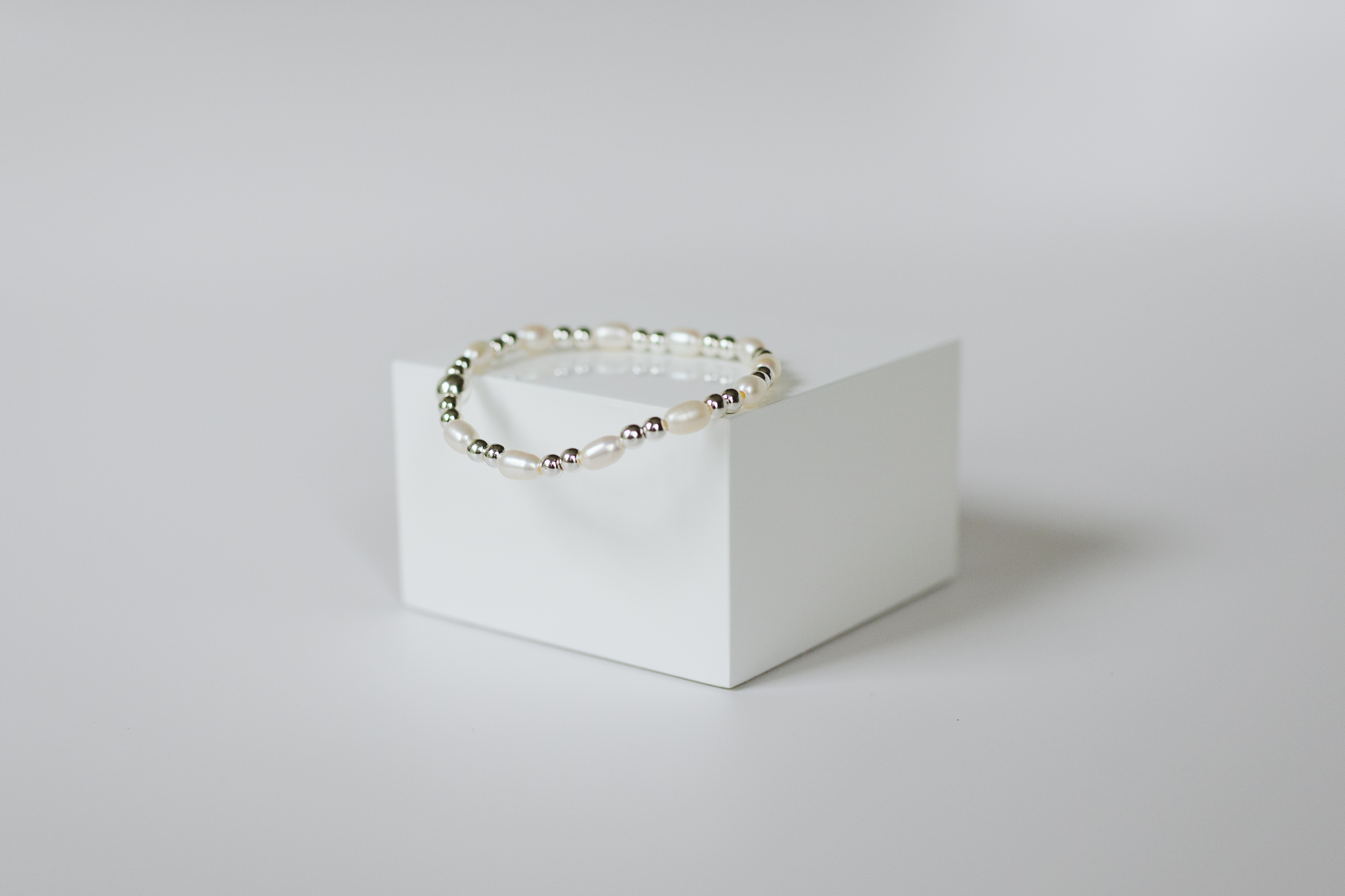 11 Freshwater Pearls with 4mm Silver