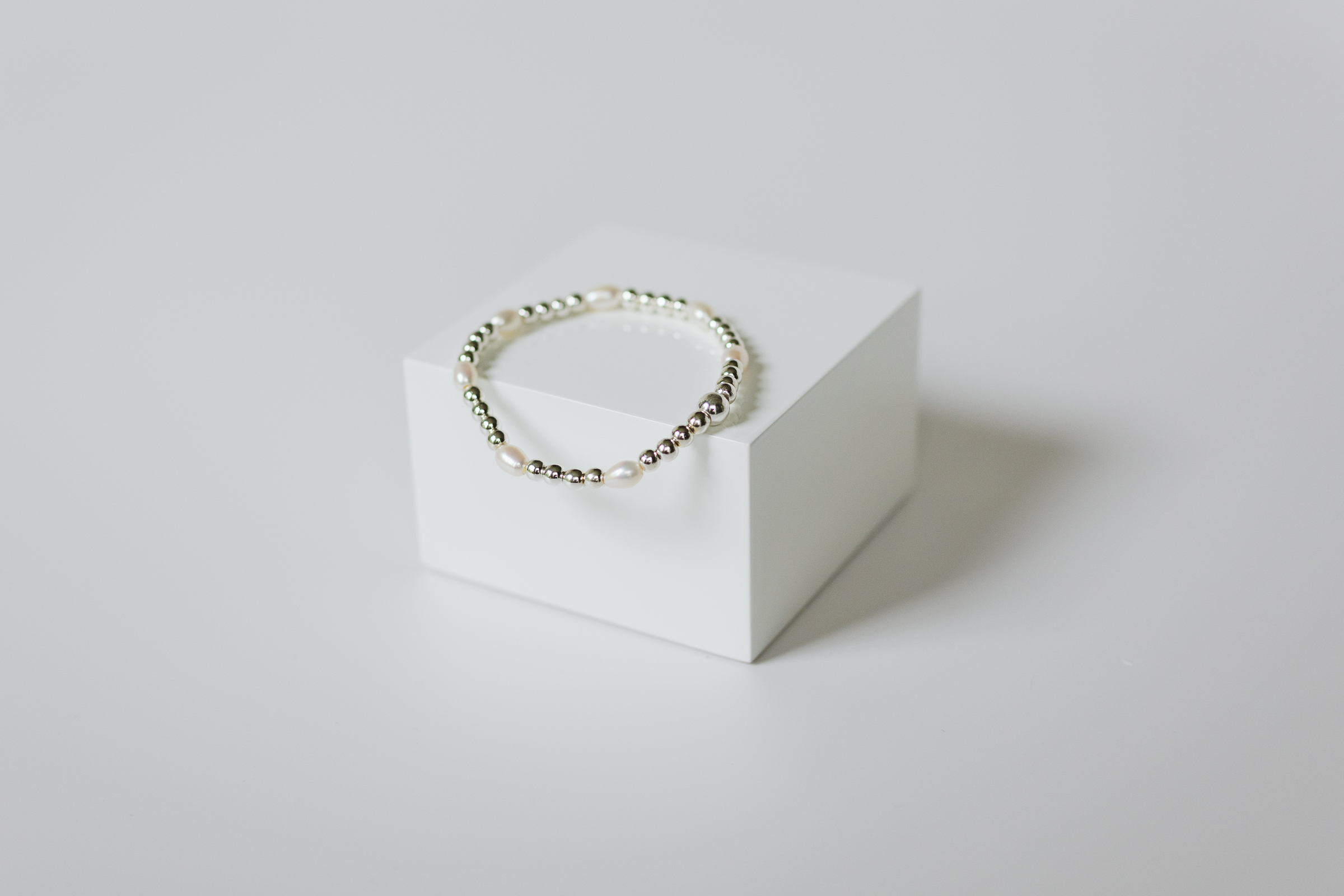7 Freshwater Pearls with 4mm Silver
