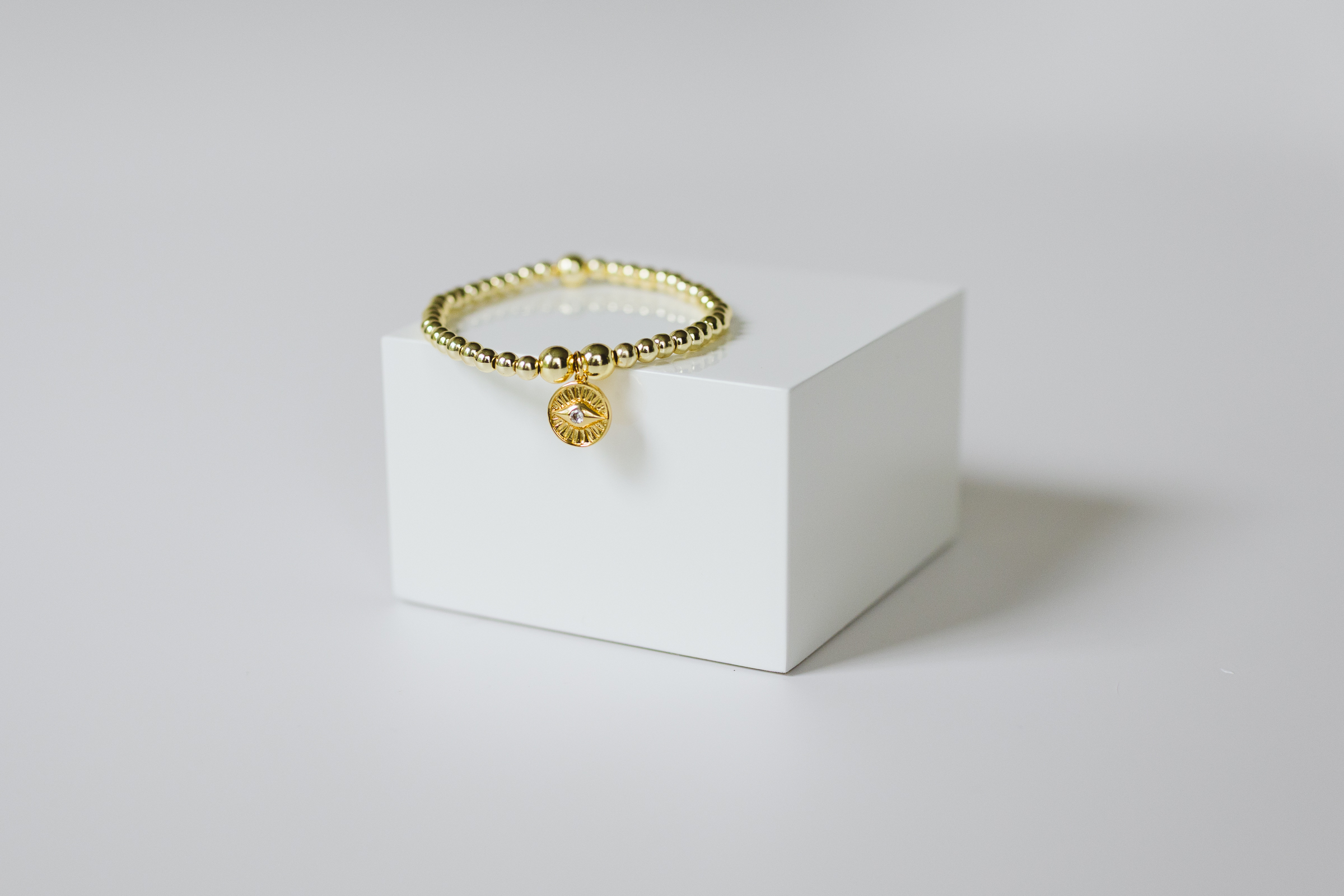 Mini round Gold Evil Eye