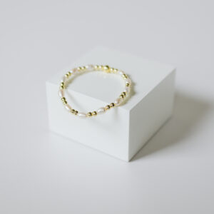 11 Freshwater Pearls with 4mm Gold